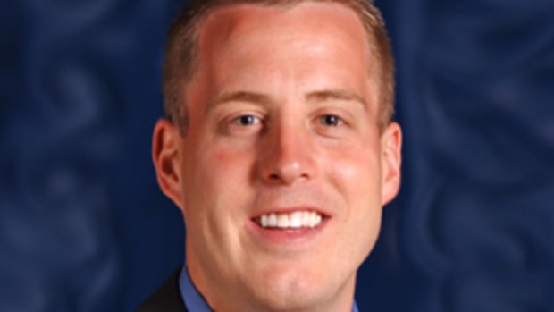 Michigan native brings six years of head coaching experience to the job.